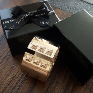 Victoria Secret gold spring cuff.